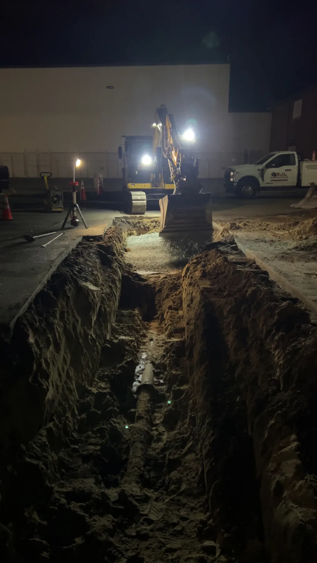 Night excavation of a broken water main for emergency repair, Chicopee MA